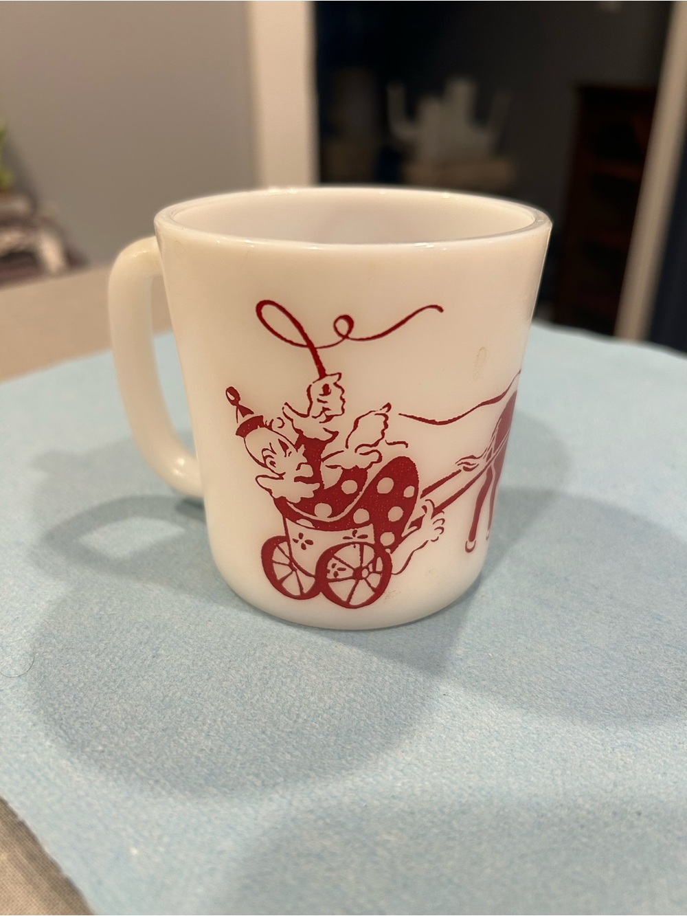 White Mug with Red Clown Carriage Graphic